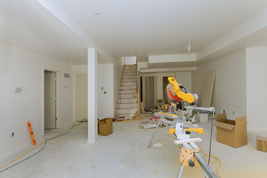 Contractor Insurance - View of a Circular Saw Sitting in a Room Inside a House That is Being Remodeled