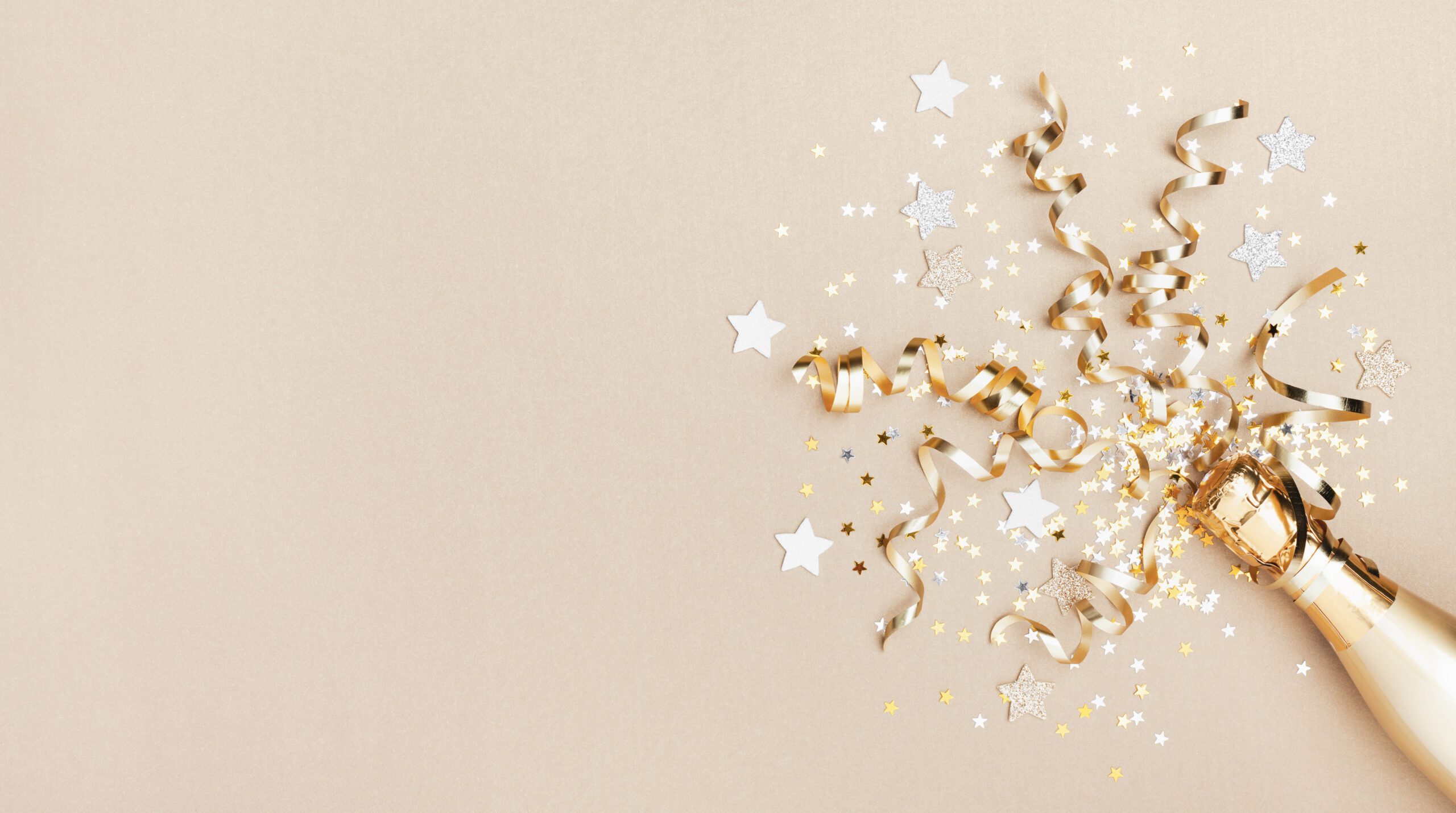 Celebration background with golden champagne bottle, confetti stars and party streamers.